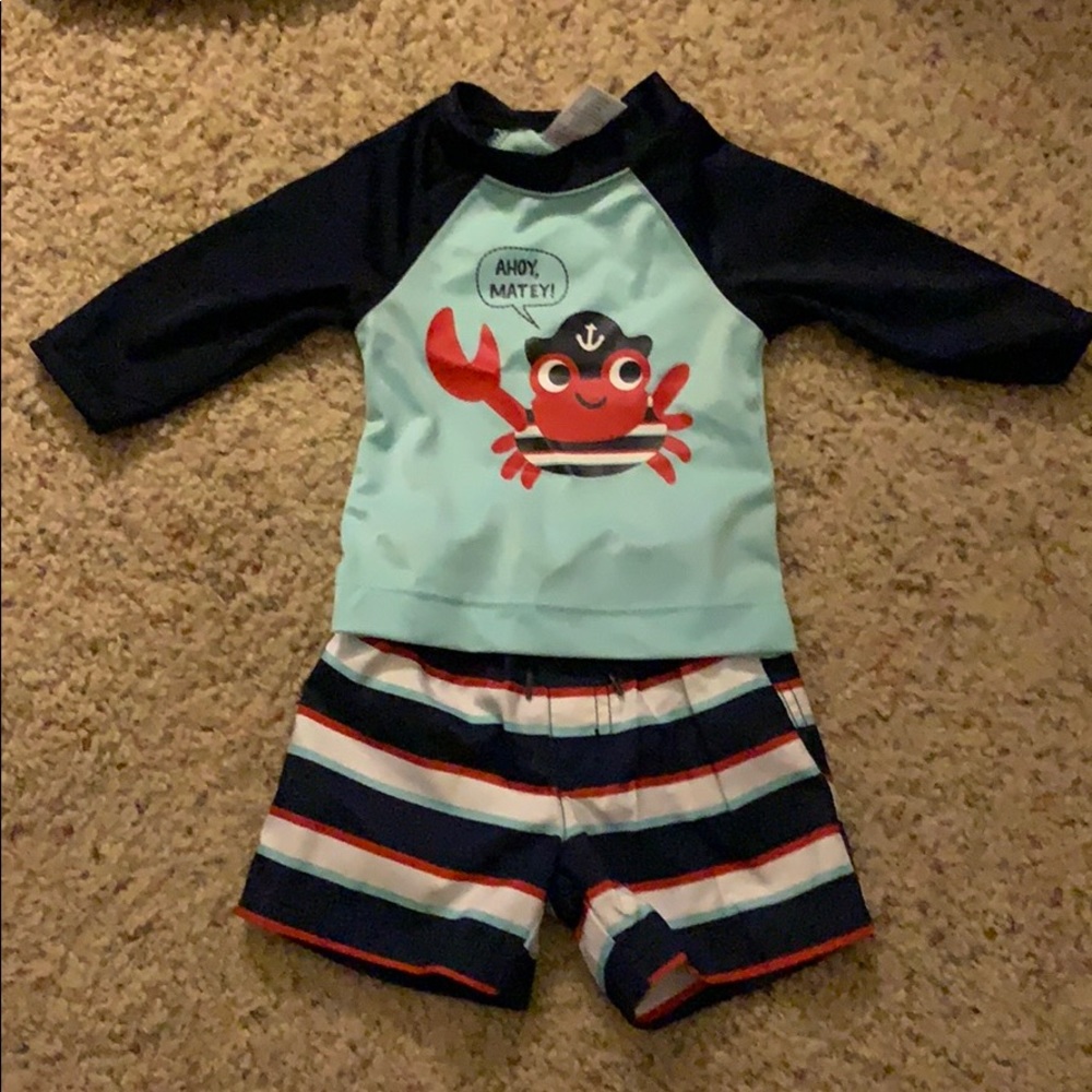 Baby boy rash guard and swim trunks
